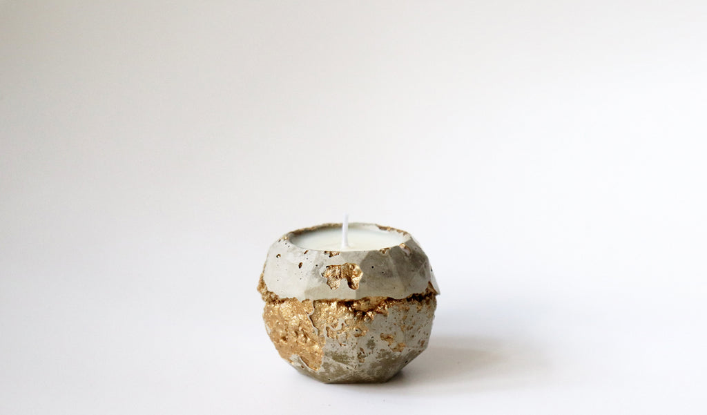 Handmade tealight soy candle in concrete container